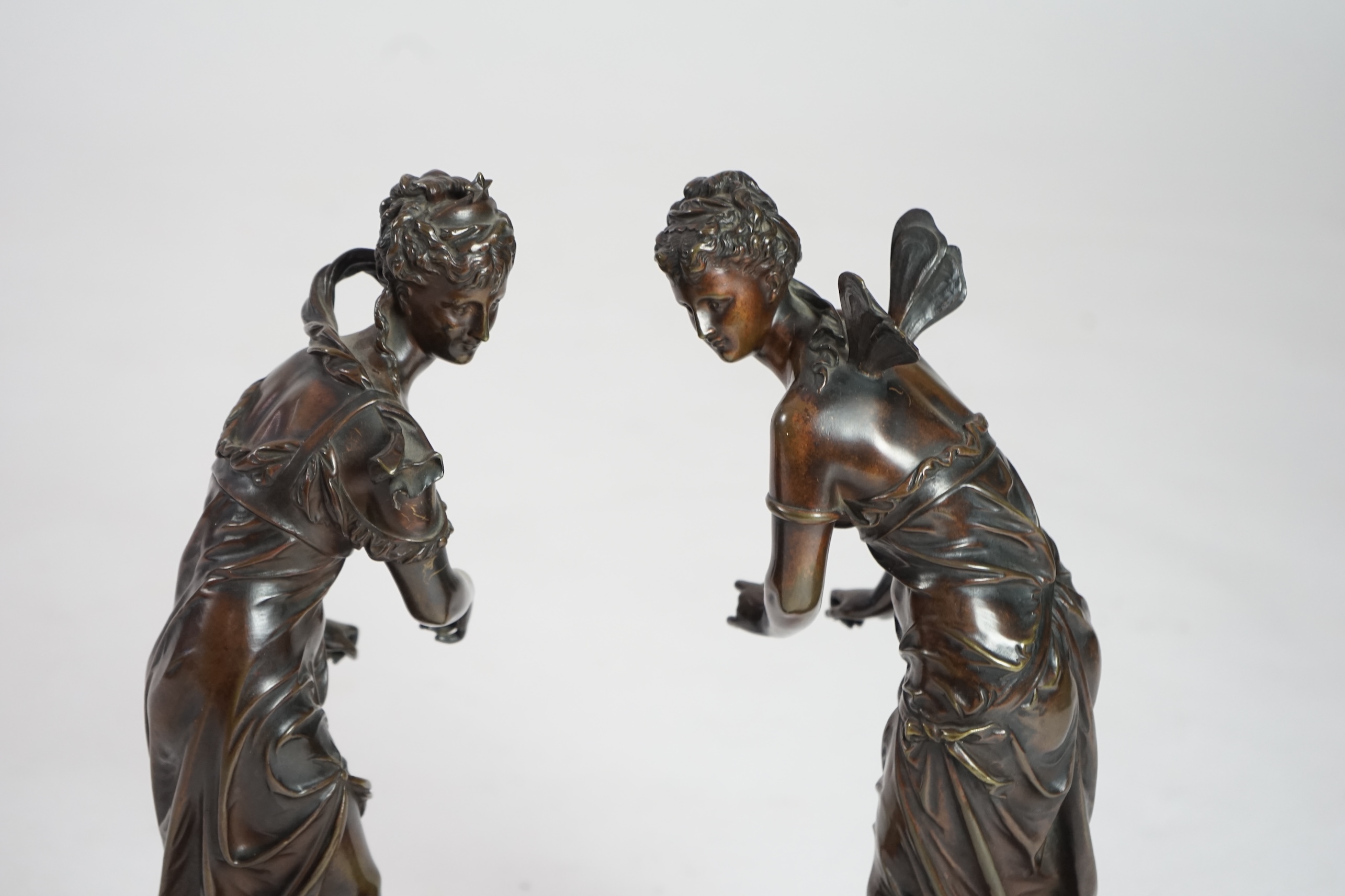 Eutrope Bouret, (French 1833-1906). A pair of late 19th century patinated bronze figures of Venus riding a dolphin and a nymph riding a tortoise